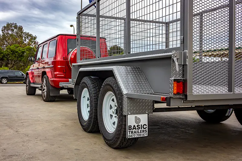 How to Tow a Trailer Safely Trailer being safely towed behind a SUV